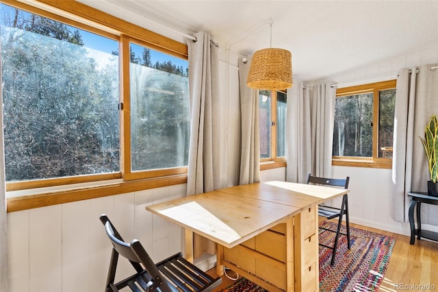 470 Bear Creek Rd, Colorado Springs, CO 80906 - dining space with wood finished floors and plenty of natural light