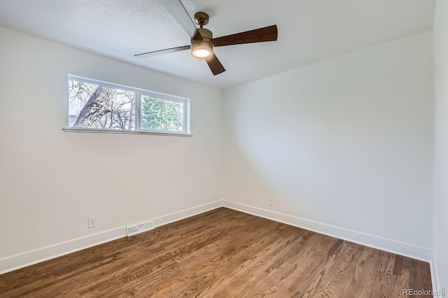 9455 W 37th Ave, Wheat Ridge, CO 80033 - empty room with baseboards, ceiling fan, and wood finished floors