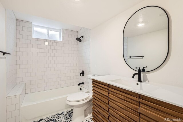9455 W 37th Ave, Wheat Ridge, CO 80033 - full bathroom featuring vanity, shower / washtub combination, toilet, and tile patterned flooring