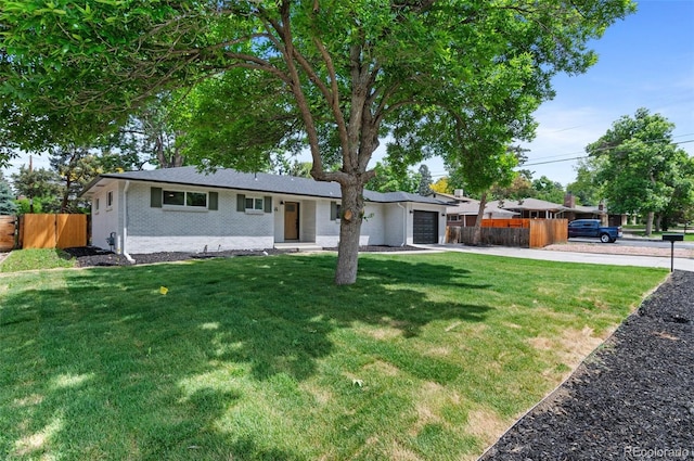9455 W 37th Ave, Wheat Ridge, CO 80033 - ranch-style house featuring a garage, concrete driveway, and brick siding