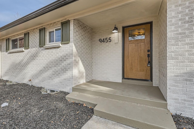 9455 W 37th Ave, Wheat Ridge, CO 80033 - entrance to property featuring brick siding