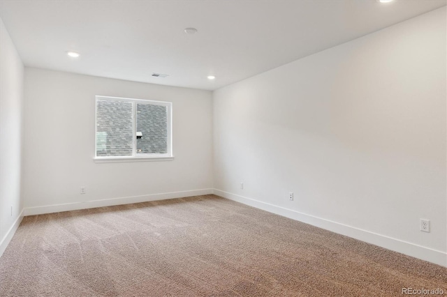 8346 Cokedale Cir, Littleton, CO 80125 - empty room featuring light colored carpet and recessed lighting