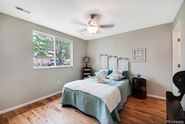 6245 W 53rd Ave, Arvada, CO 80002 - bedroom with baseboards, wood finished floors, and a ceiling fan