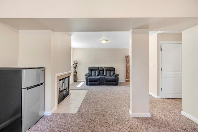 3516 Marigold St, Evans, CO 80620 - interior space with a tiled fireplace and baseboards