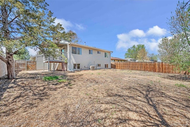 3516 Marigold St, Evans, CO 80620 - rear view of house with a fenced backyard and cooling unit