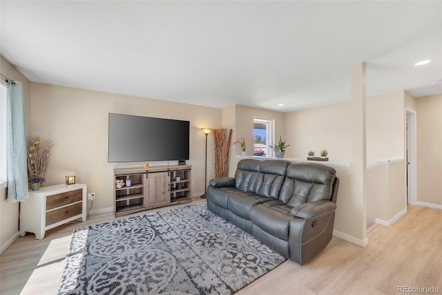 3516 Marigold St, Evans, CO 80620 - living room with baseboards, recessed lighting, and wood finished floors