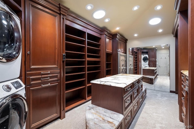 17575 E Kettle Pl, Centennial, CO 80016 - spacious closet with light carpet and stacked washer and clothes dryer