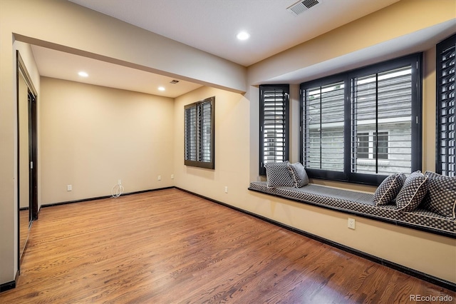 17575 E Kettle Pl, Centennial, CO 80016 - spare room featuring recessed lighting, visible vents, baseboards, and wood finished floors