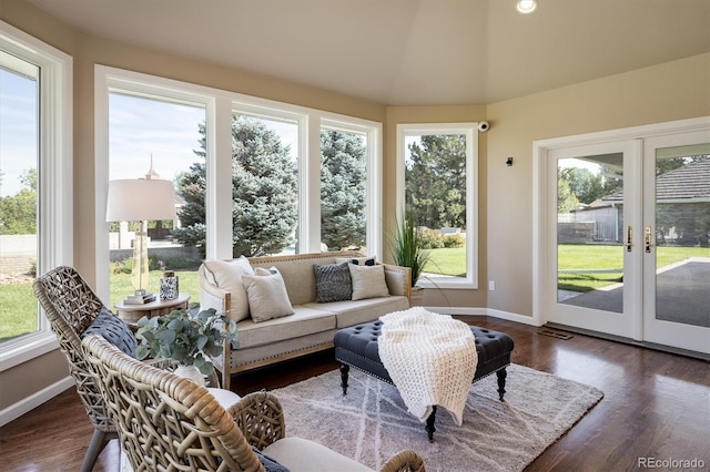 sunroom / solarium featuring a wealth of natural light and french doors