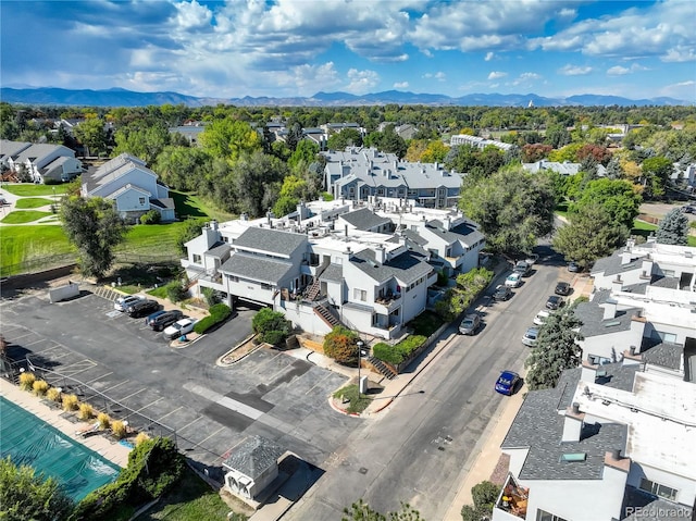 drone / aerial view with a residential view and a mountain view