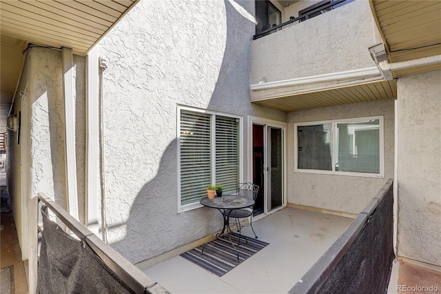 doorway to property with stucco siding