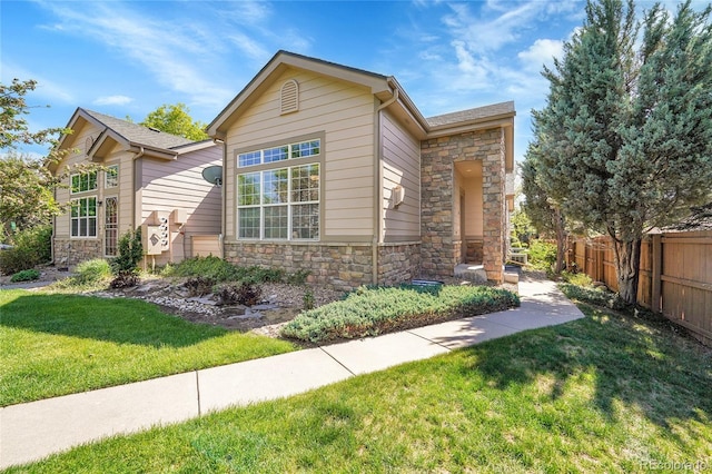 14333 E Napa Pl Unit 5D, Aurora, CO 80014 - view of front of house featuring stone siding