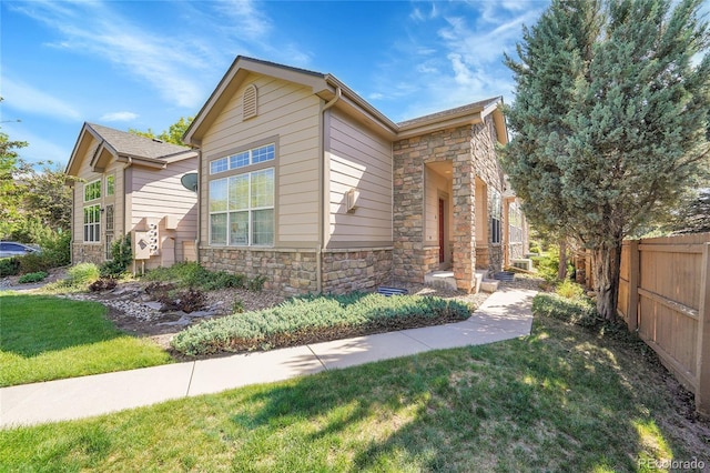 14333 E Napa Pl Unit 5D, Aurora, CO 80014 - view of front facade featuring stone siding