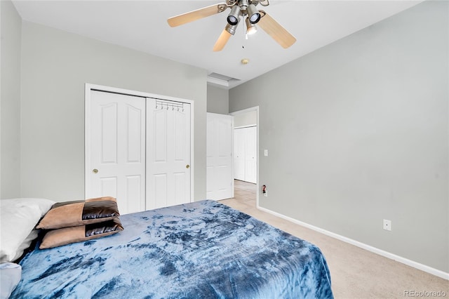 14333 E Napa Pl Unit 5D, Aurora, CO 80014 - bedroom with baseboards, a closet, light colored carpet, and ceiling fan
