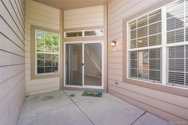 14333 E Napa Pl Unit 5D, Aurora, CO 80014 - view of exterior entry featuring a patio