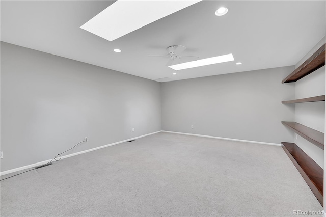 14333 E Napa Pl Unit 5D, Aurora, CO 80014 - carpeted spare room with a skylight, recessed lighting, a ceiling fan, and baseboards