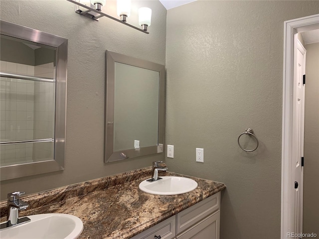 68 Golf Course Dr Unit 11, Copper Mountain, CO 80443 - full bathroom featuring double vanity and tiled shower