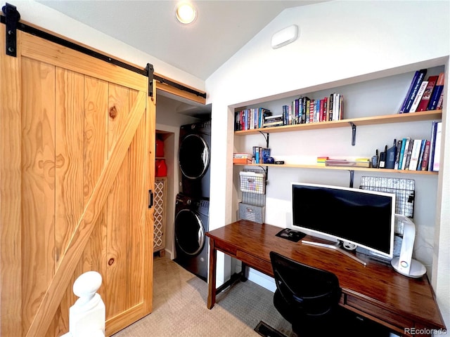 68 Golf Course Dr Unit 11, Copper Mountain, CO 80443 - office space with stacked washer / drying machine, a barn door, lofted ceiling, and light carpet
