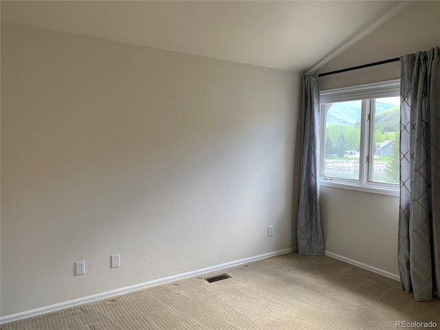 68 Golf Course Dr Unit 11, Copper Mountain, CO 80443 - empty room with lofted ceiling, light colored carpet, and baseboards