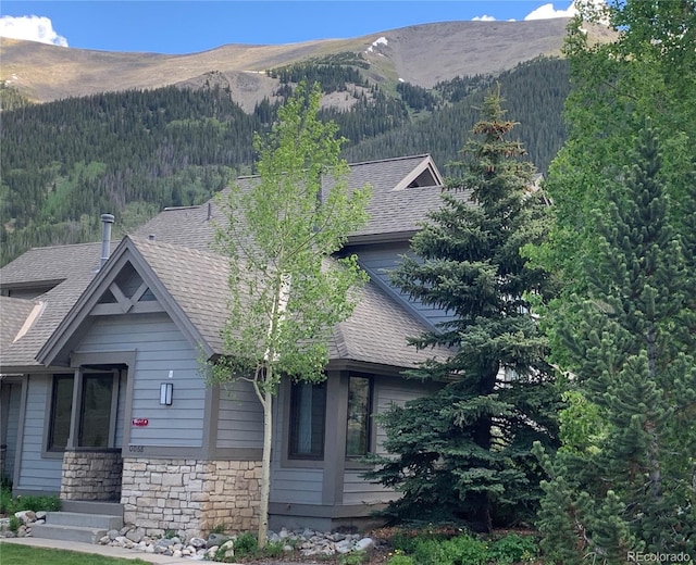 68 Golf Course Dr Unit 11, Copper Mountain, CO 80443 - mountain view featuring a forest