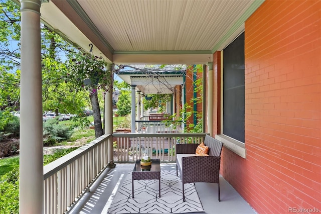 balcony featuring covered porch