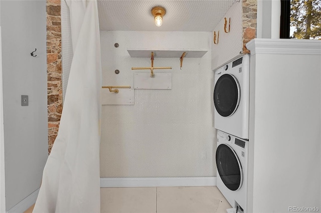 148 Ridge Ln, Bailey, CO 80421 - laundry room featuring estacked washer and dryer