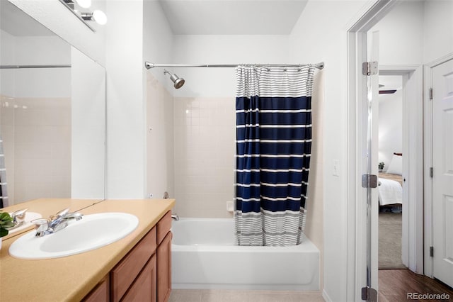 bathroom with shower / bath combination with curtain and vanity