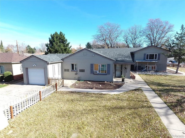 view of front facade with a garage and a front yard