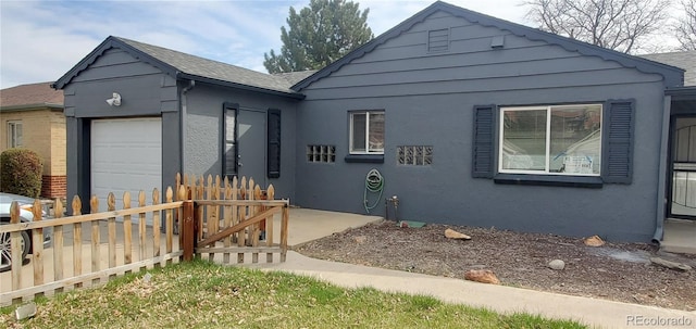 view of front of home featuring a garage