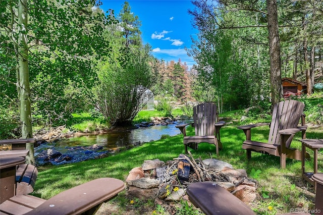 view of yard with a water view