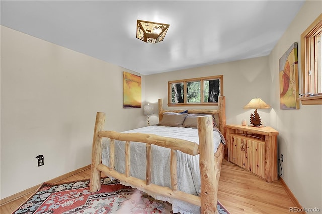 bedroom featuring light hardwood / wood-style floors