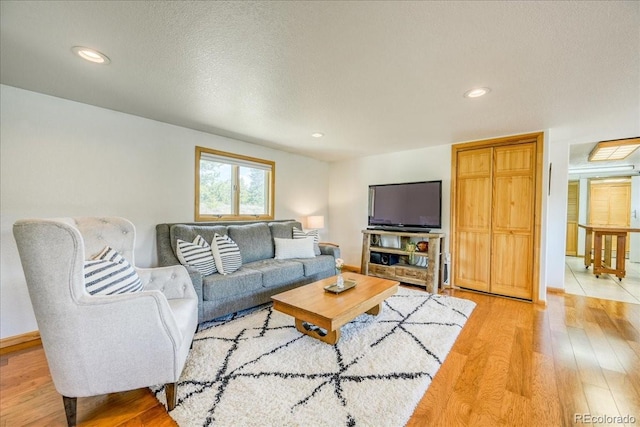 38 D Rd, Silverthorne, CO 80498 - living area featuring light wood finished floors, recessed lighting, and baseboards