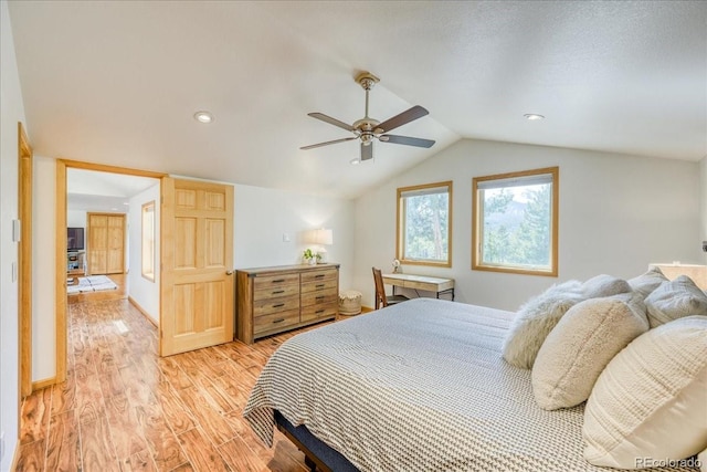 38 D Rd, Silverthorne, CO 80498 - bedroom with light wood finished floors, vaulted ceiling, a ceiling fan, and recessed lighting