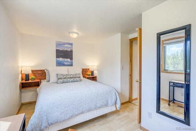 38 D Rd, Silverthorne, CO 80498 - bedroom with light wood-type flooring and baseboards