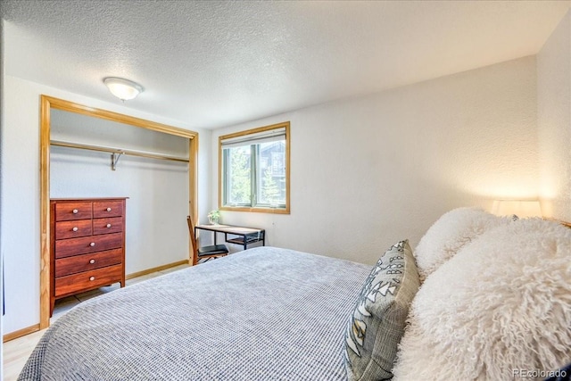 38 D Rd, Silverthorne, CO 80498 - bedroom with a closet and a textured ceiling