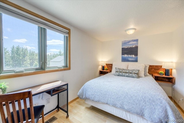 38 D Rd, Silverthorne, CO 80498 - bedroom featuring light wood-type flooring and baseboards