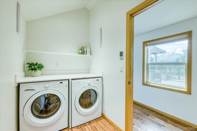 38 D Rd, Silverthorne, CO 80498 - laundry area with separate washer and dryer, light wood-type flooring, and baseboards