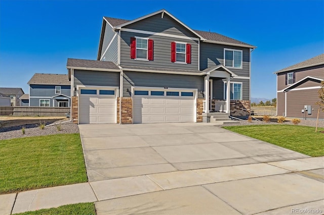 view of front facade with a garage and a front yard