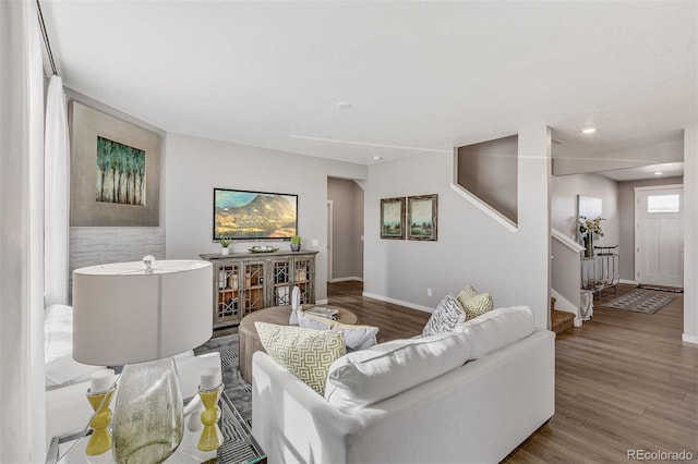 living room with light hardwood / wood-style floors