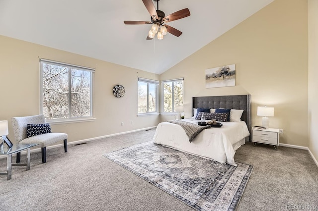 carpeted bedroom featuring ceiling fan and high vaulted ceiling