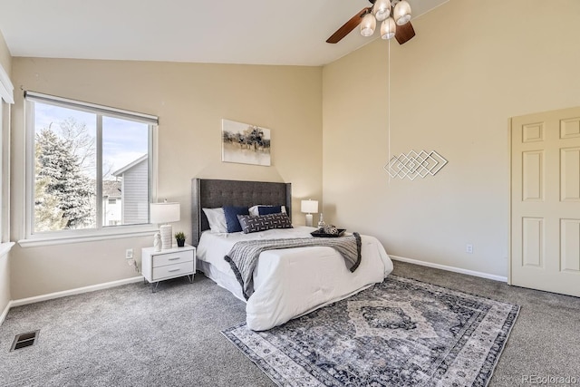 carpeted bedroom featuring vaulted ceiling and ceiling fan