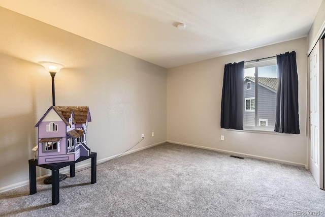 miscellaneous room featuring carpet floors