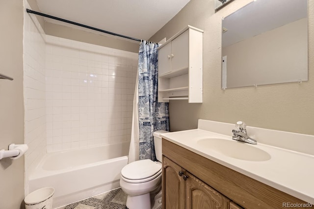 full bathroom featuring shower / tub combo, vanity, and toilet