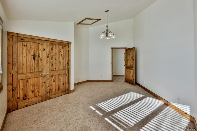 bedroom with an inviting chandelier, high vaulted ceiling, and light carpet