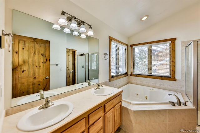 bathroom with lofted ceiling, plus walk in shower, and vanity