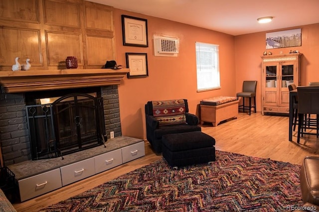 6213 Gray St, Arvada, CO 80003 - living room featuring a fireplace and wood finished floors