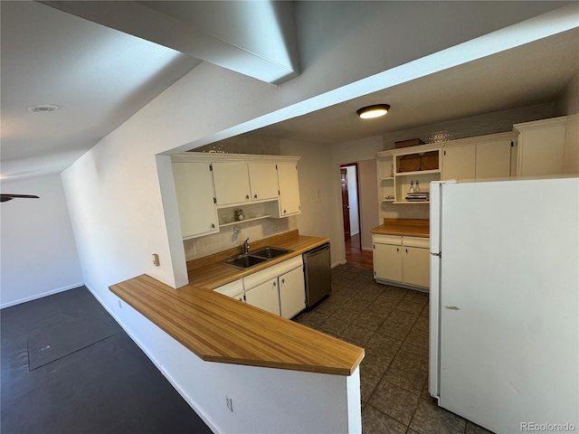 6213 Gray St, Arvada, CO 80003 - kitchen with freestanding refrigerator, a sink, stainless steel dishwasher, open shelves, and light countertops