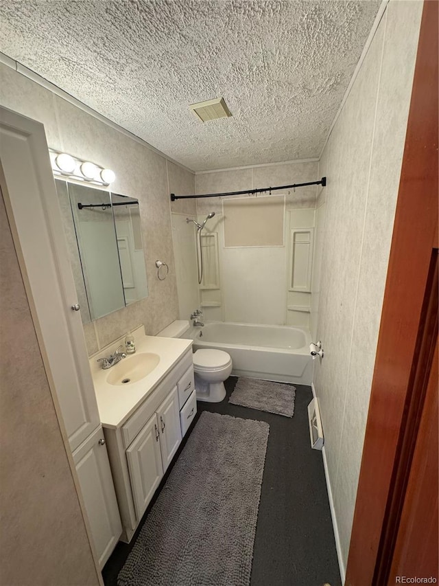6213 Gray St, Arvada, CO 80003 - full bathroom featuring a textured ceiling, toilet, shower / washtub combination, vanity, and a textured wall