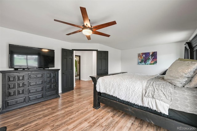 bedroom featuring hardwood / wood-style flooring and ceiling fan