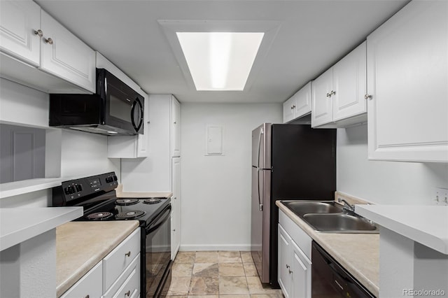 910 S Walden St Unit 106, Aurora, CO 80017 - kitchen featuring black appliances, white cabinets, baseboards, a sink, and light countertops